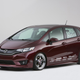 Illustration for article titled A Honda Fit With A Grom In The Back Is Something We Need Yesterday